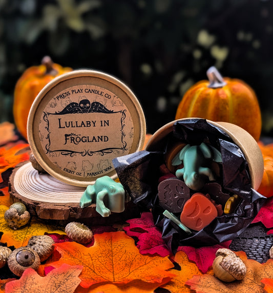 “Lullaby in Frogland wax melts shaped like pumpkins, leaves, and frogs, scented with apple, lily of the valley, and amber.”